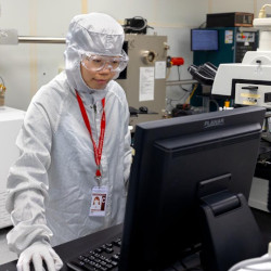 Postdoctoral researcher Ying Yang works in the CNF cleanroom in Duffield Hall.